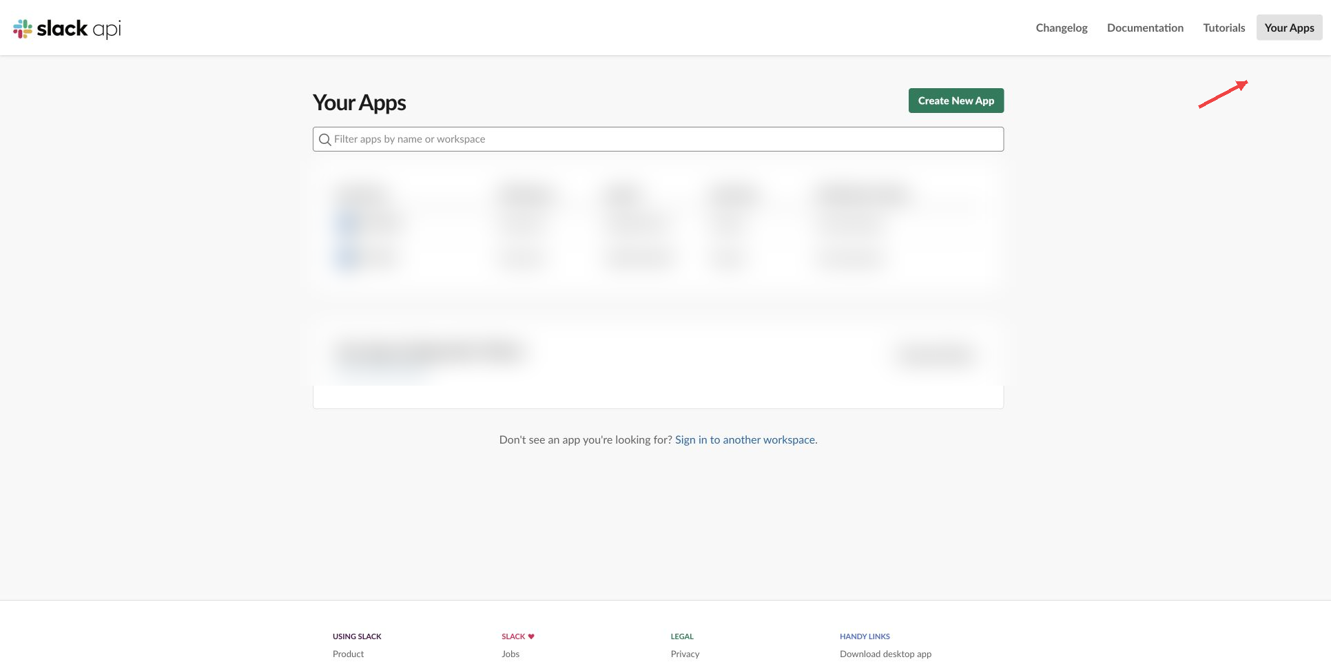 真实 Slack API 管理页,红色短箭头指向 Create New App